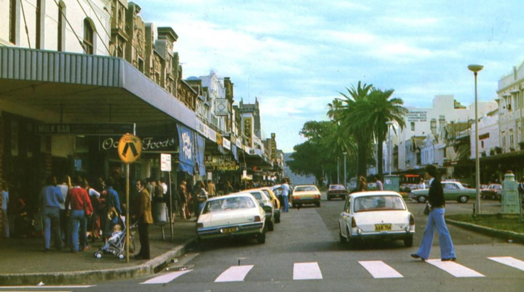 The Corso, Manly, before pedestrianisation — cars and traffic dominate the street
